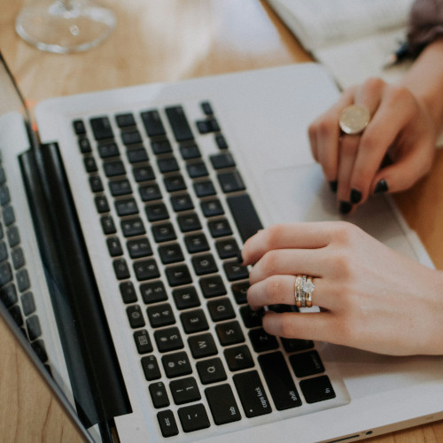 A person on a laptop doing work.
